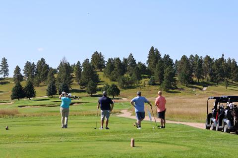 Foursome at The Golf Club at Devils Tower